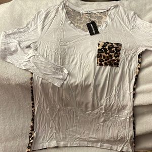 White front leopard print back casual top by anyfit wear. Never worn